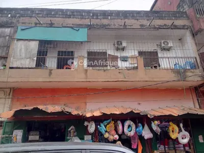 Immeuble R+2 avec commerces — Adjamé Béhibr