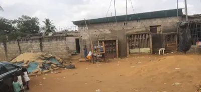 Terrain 396 m² — Abobo Derrière Rail